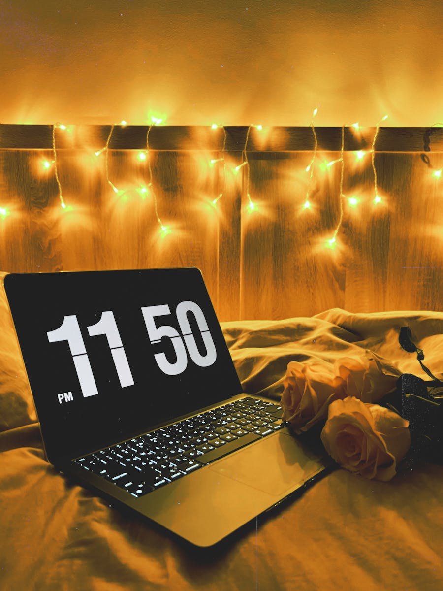 Warm fairy lights in a cozy bedroom as lifestyle inspiration