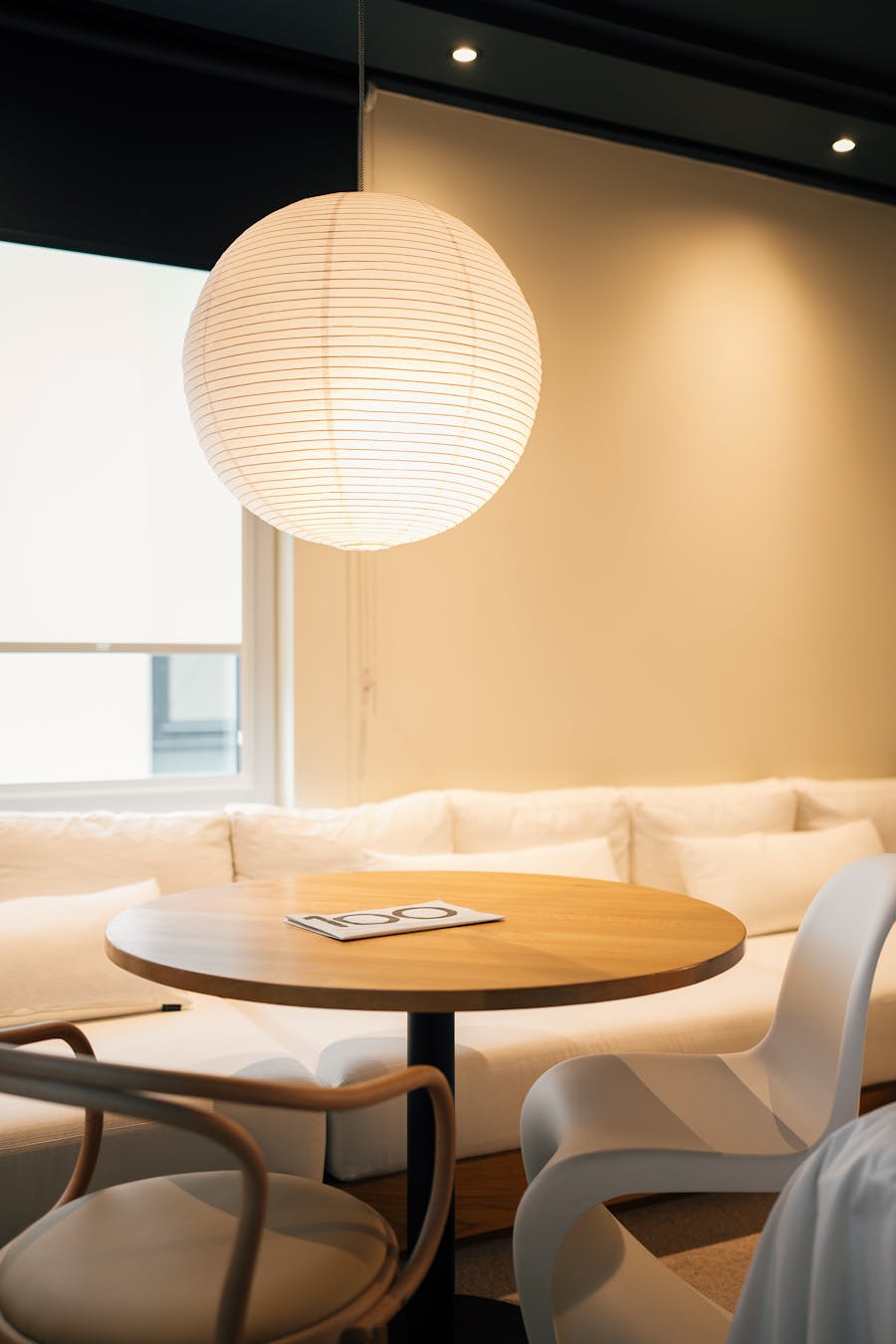 Round paper lantern in a minimalist interior as lifestyle inspiration